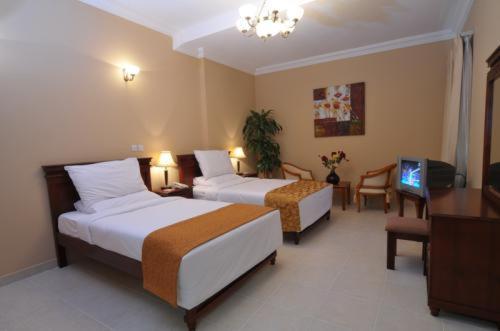 Le Grand Hotel Dauhá Pokoj fotografie